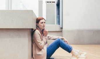 Depressed woman with cannabis