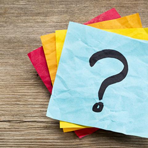 question marks written on Post-It notes