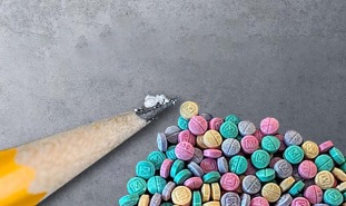 Fentanyl on pencil and rainbow fentanyl pills